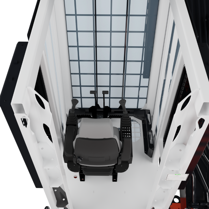 Operator's seat cabin with controls and joysticks inside a white enclosed machine cabin.