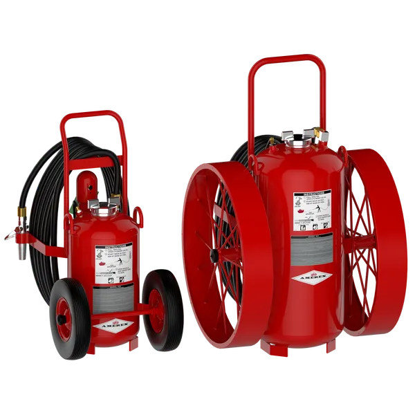 Person in navy shirt holding a red Amerex fire extinguisher with instruction label.