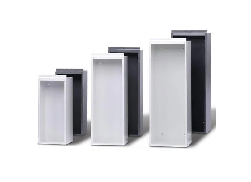 Person in navy shirt holding a red Amerex fire extinguisher with instruction label.