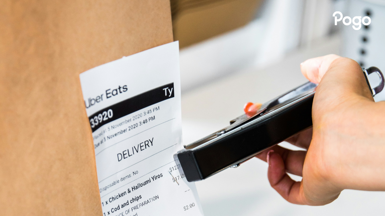 Attaching receipts to a food order.