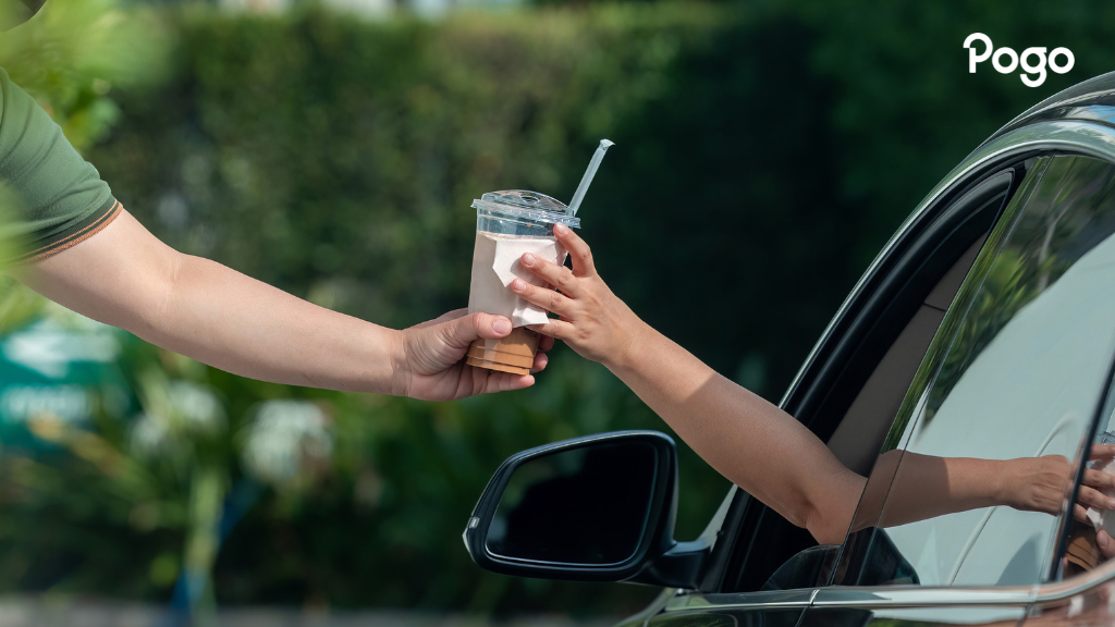 A fast-food drive-through window. 