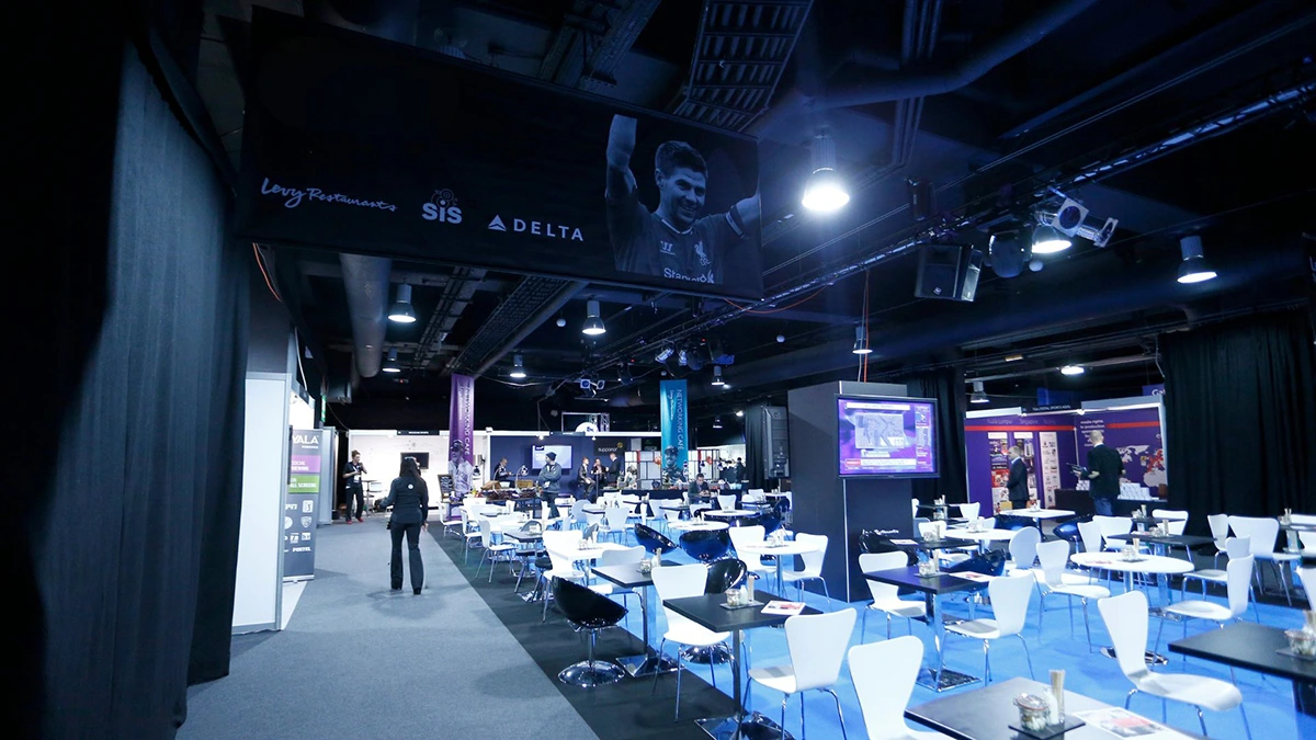 Marketing trade show with tables and stands, but without people.