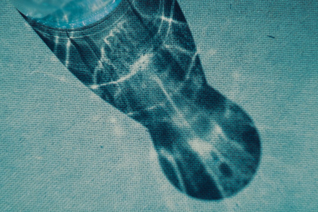 A picture of a person's foot with a watch on it — Photo by Nastia Petruk on Unsplash