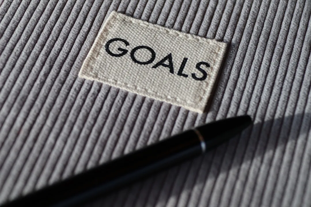 black and silver pen on grey textile. Photo by Ronnie Overgoor on Unsplash
