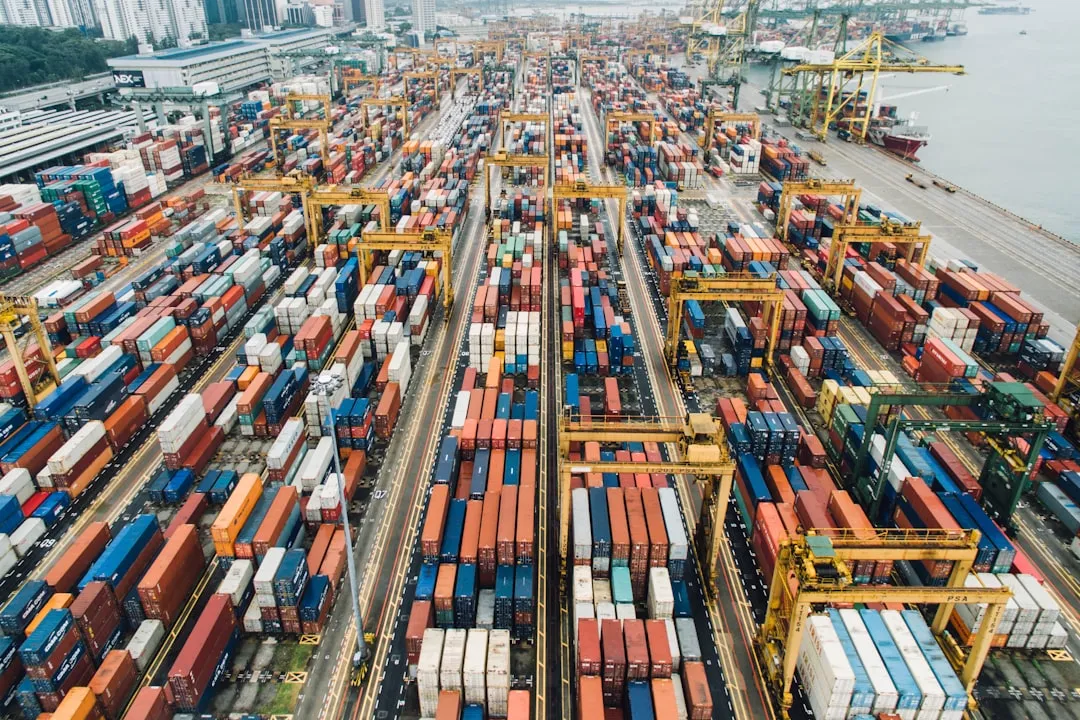 aerial photo of cargo crates. Photo by CHUTTERSNAP on Unsplash