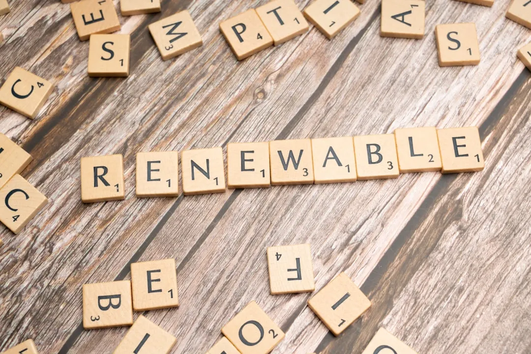 a scrabble of scrabble tiles spelling the word re - re -. Photo by Markus Winkler on Unsplash