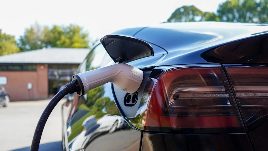 black car in tilt shift lens. Photo by myenergi on Unsplash
