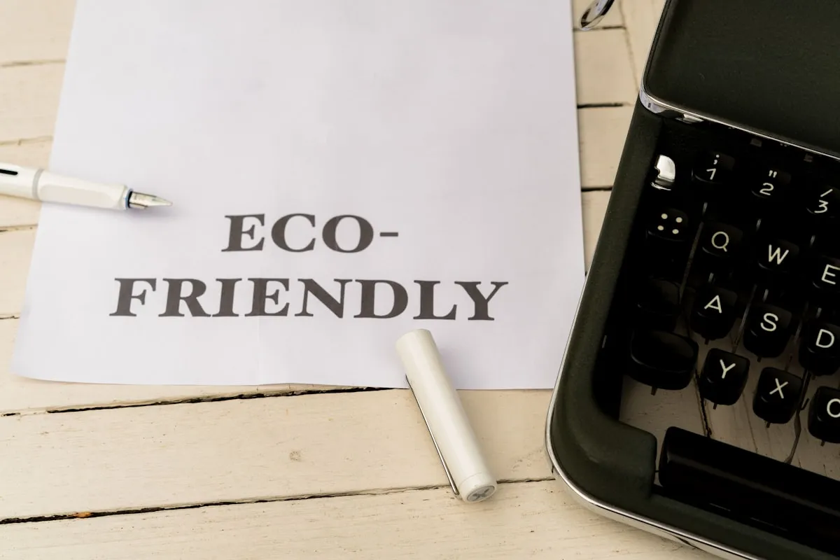 a piece of paper that says eco - friendly next to a typewriter. Photo by Markus Winkler on Unsplash