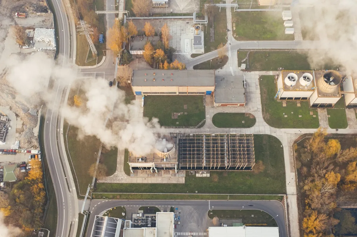 white smoke coming out from a window. Photo by Marcin Jozwiak on Unsplash