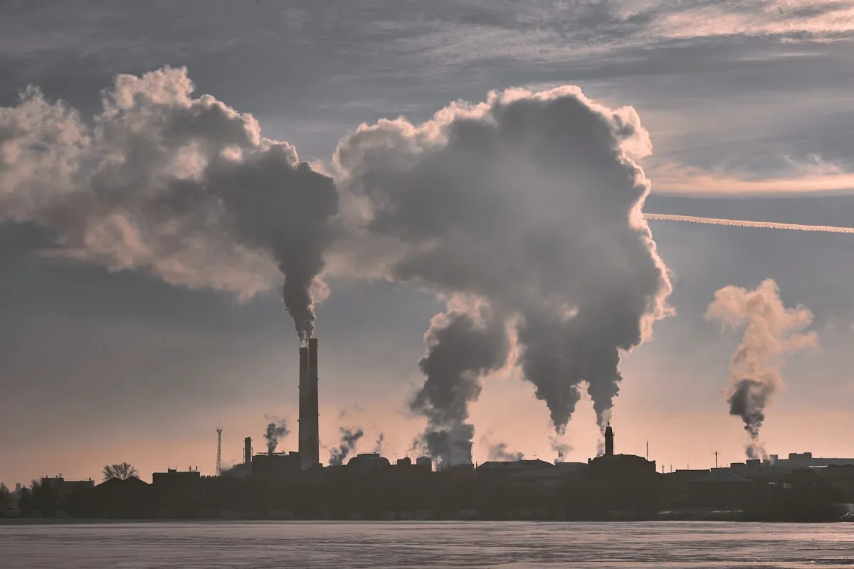 Office building against cloud, illustrating corporate value chain emissions