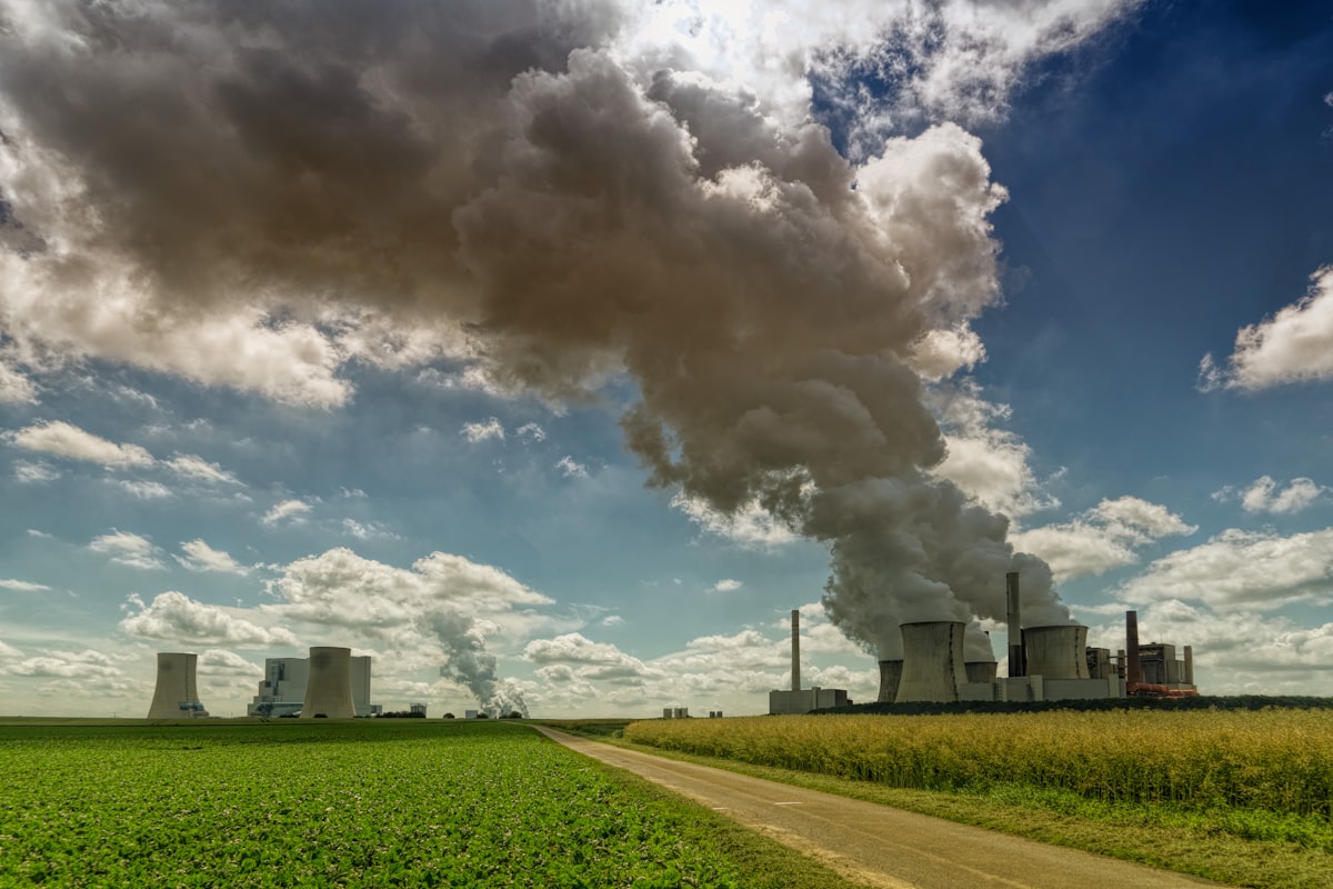 smoking factory during daytime — Photo by Johannes Plenio on Unsplash