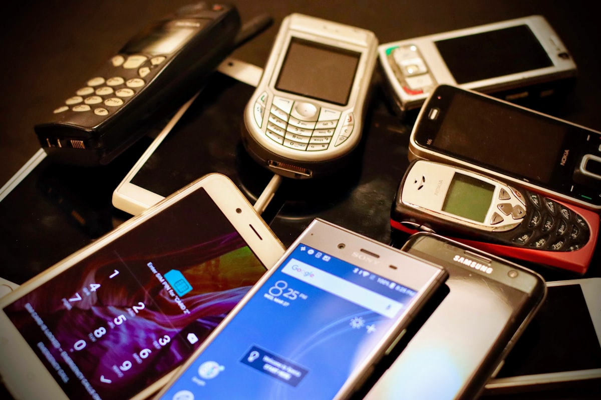 assorted-color phone lot — Photo by Eirik Solheim on Unsplash