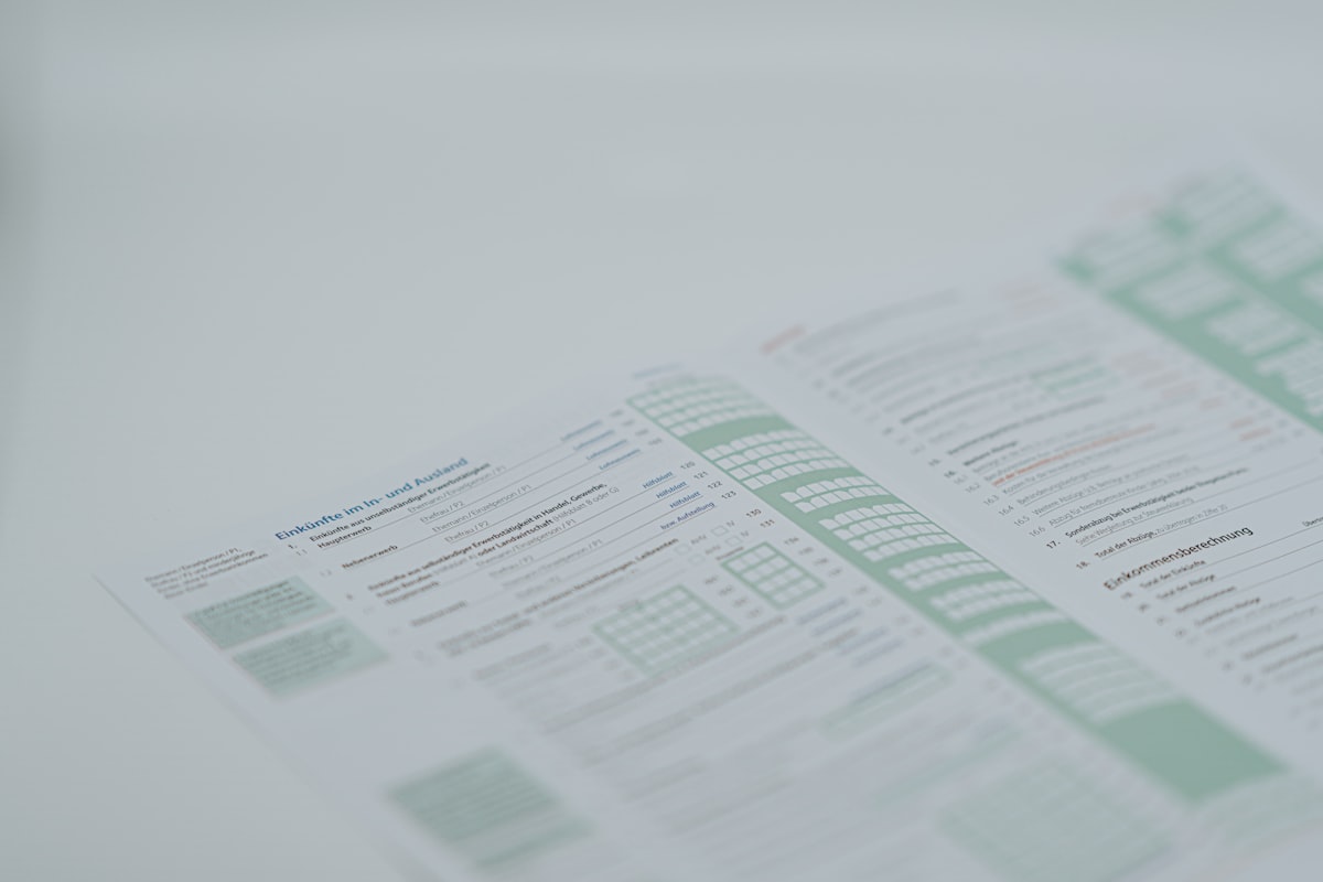 a close up of a menu on a table — Photo by Claudio Schwarz on Unsplash