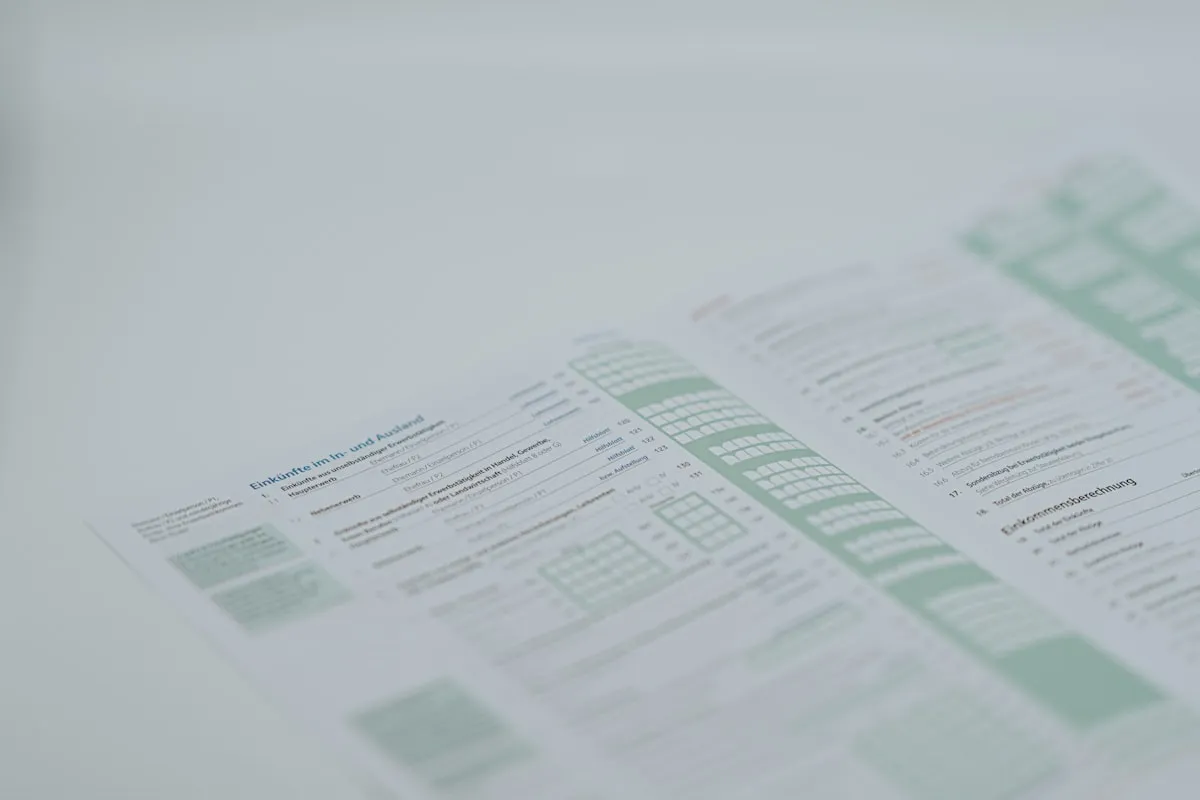 a close up of a menu on a table. Photo by Claudio Schwarz on Unsplash