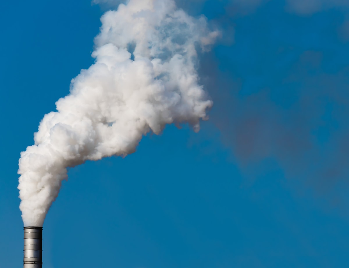 white smoke from factory chimney, Photo by Pawel Czerwinski on Unsplash