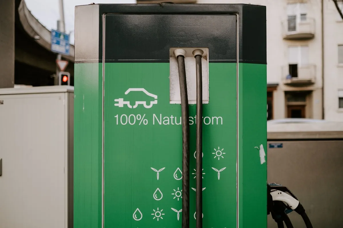An electric vehicle charging station is shown.. Photo by Claudio Schwarz on Unsplash