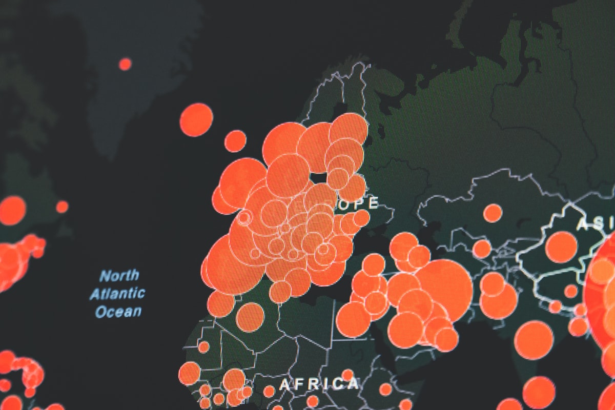 Dark world map with red circles clustered over Europe and Africa