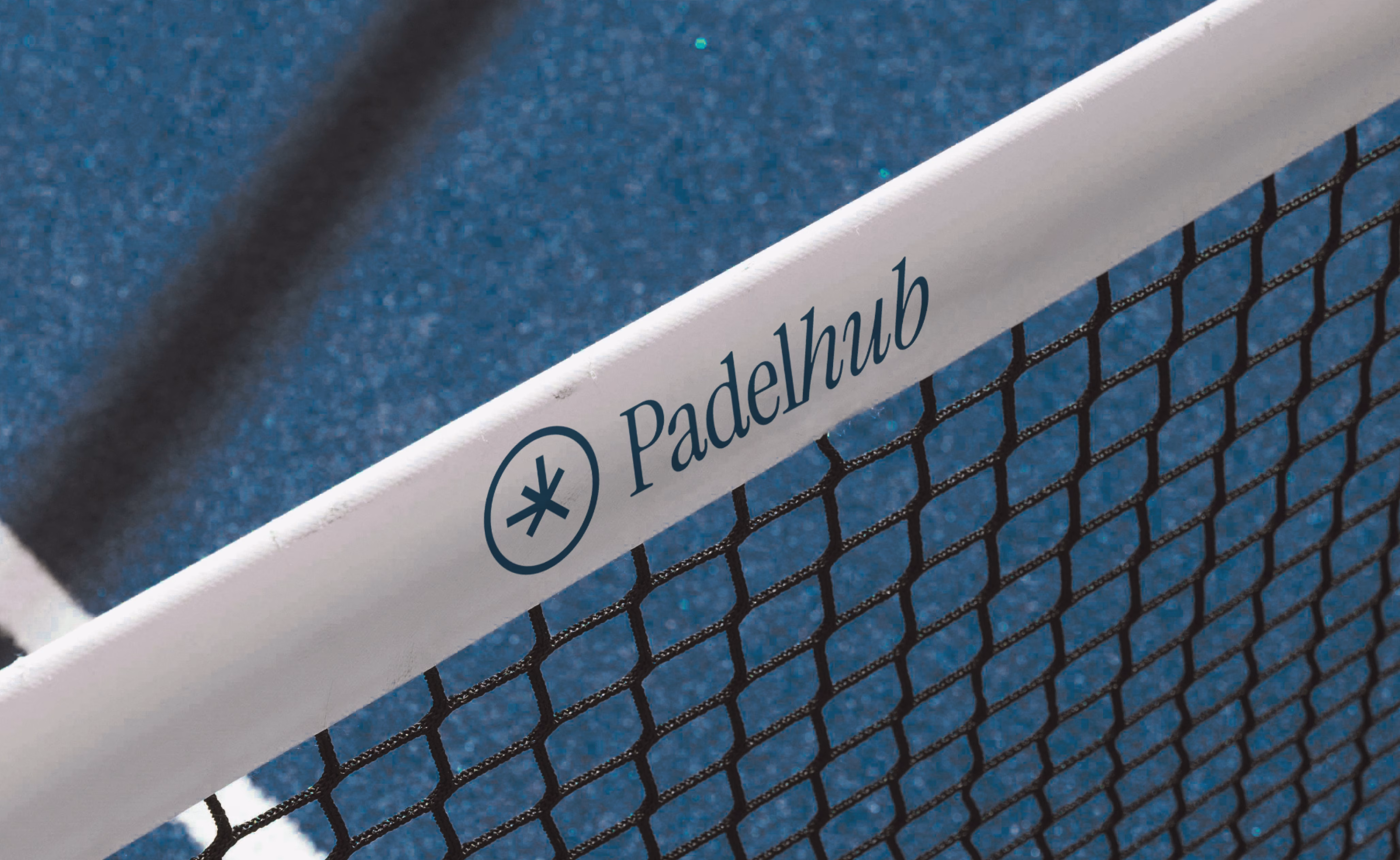 Padelhub court frame signage with logo and name applied to barrier