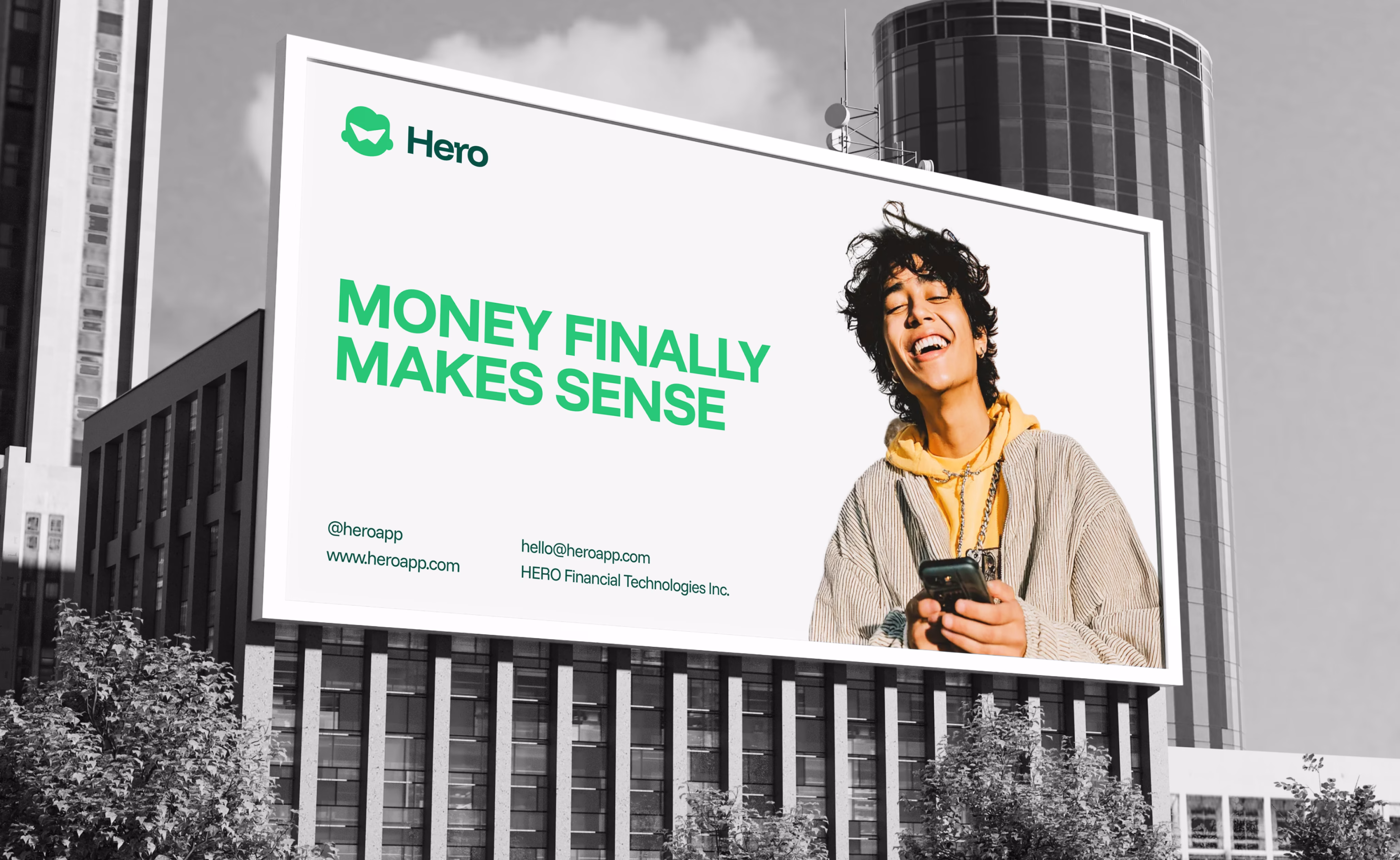 Hero Trading App brand campaign billboard showing tagline and lifestyle photography in urban setting by Hatypo Studio