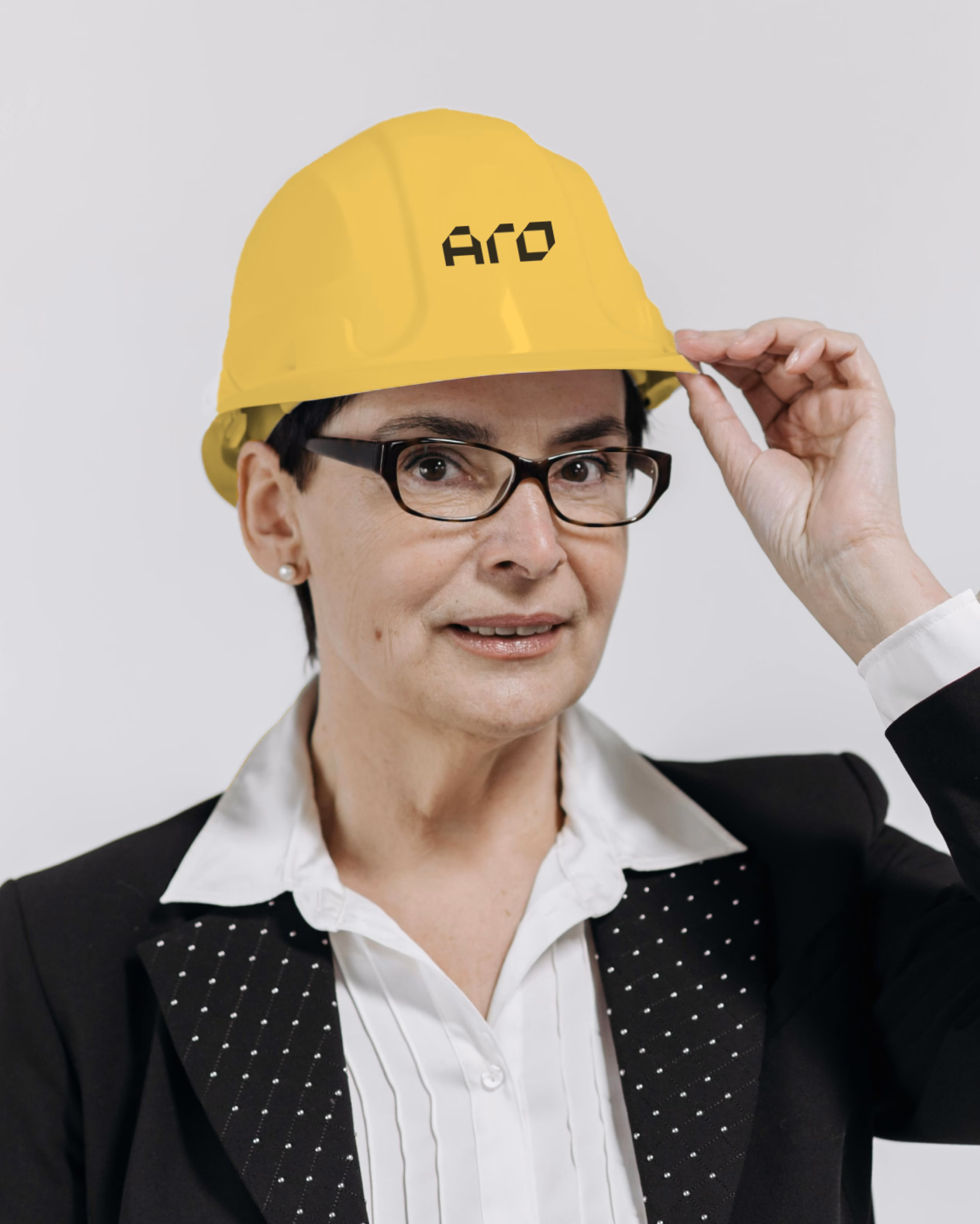 ARO Construction employee in branded safety equipment with company identity