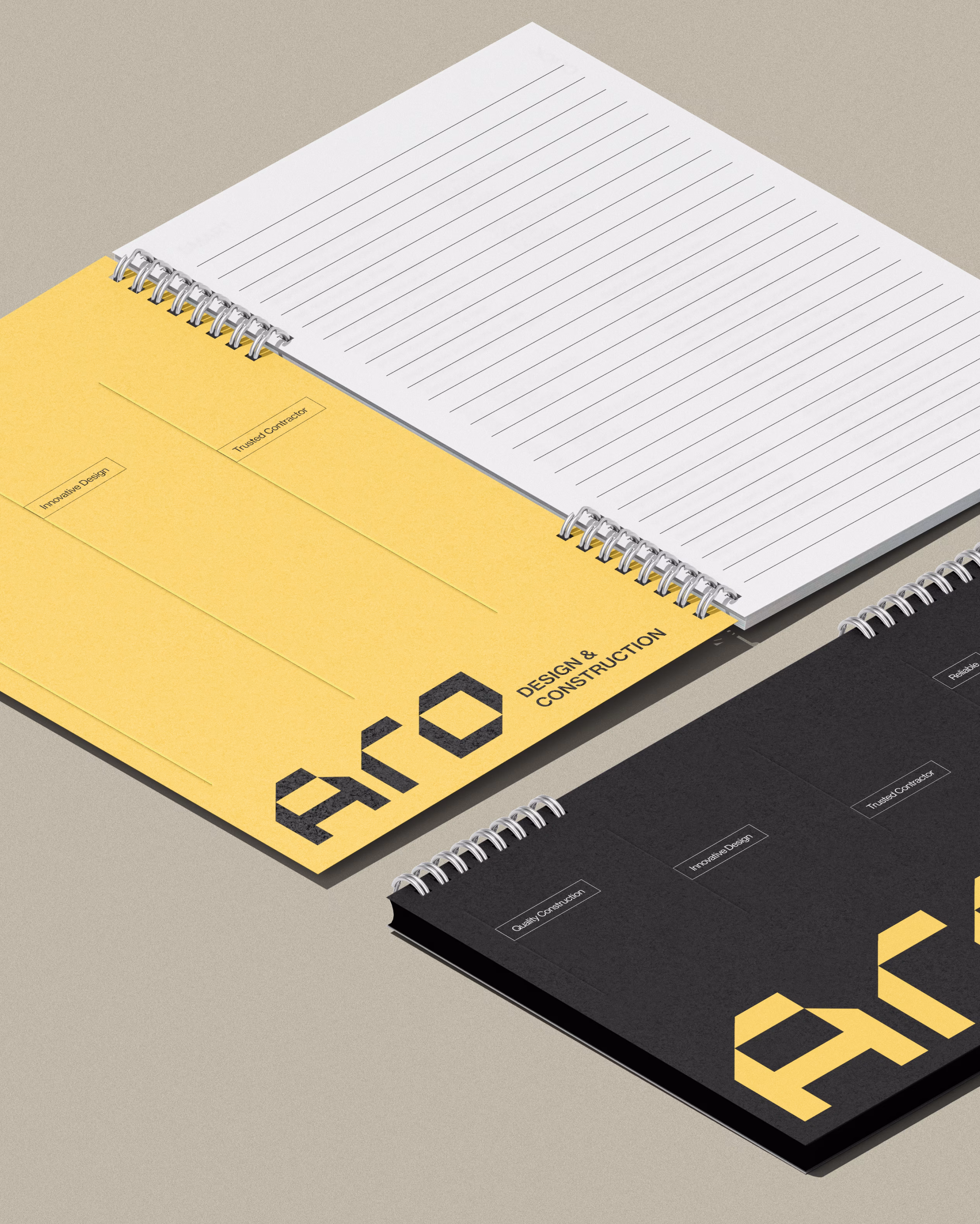 ARO Construction stationery design with yellow accent branding