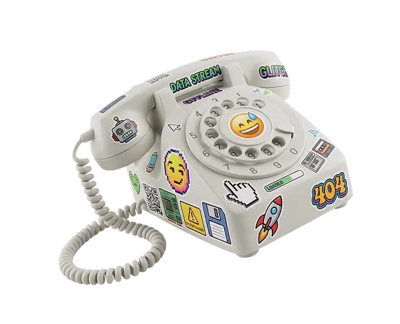 White vintage rotary phone decorated with colorful digital-themed stickers including emojis, a rocket, a floppy disk, and text like '404' and 'DATA STREAM'.