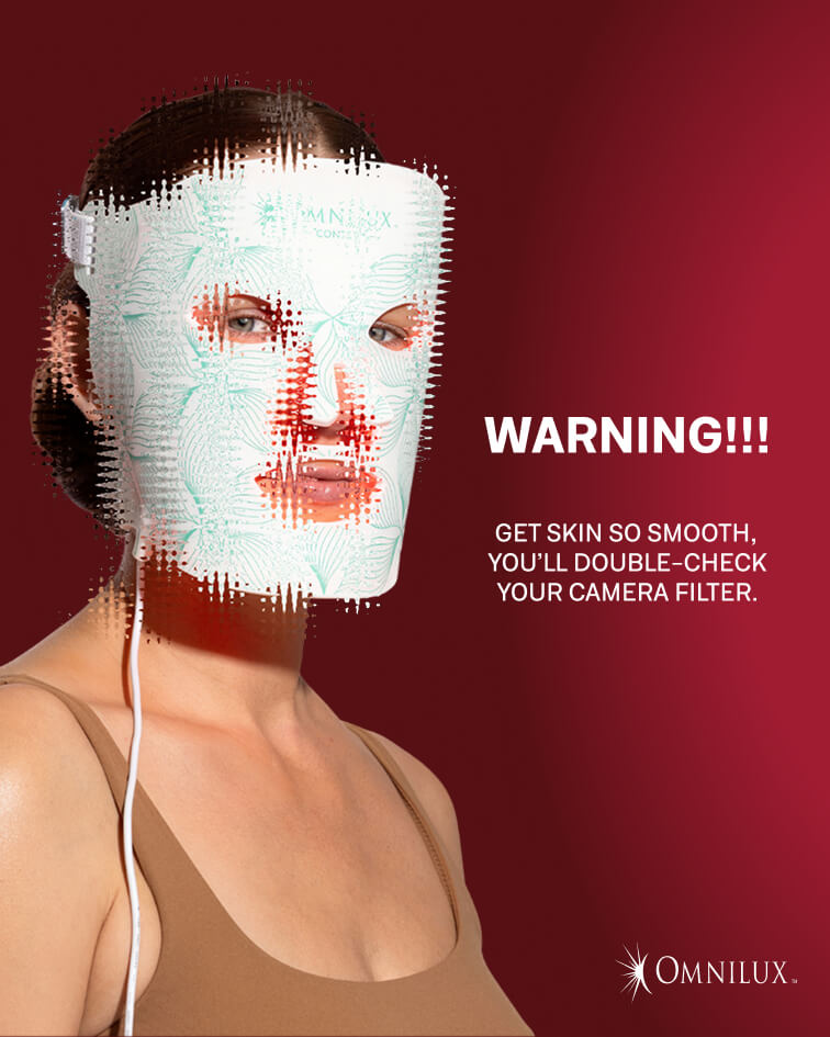 Omnilux ad featuring a woman wearing an LED face mask with a digital glitch filter effect against a deep red background. Text reads: "WARNING!!! GET SKIN SO SMOOTH, YOU’LL DOUBLE-CHECK YOUR CAMERA FILTER."