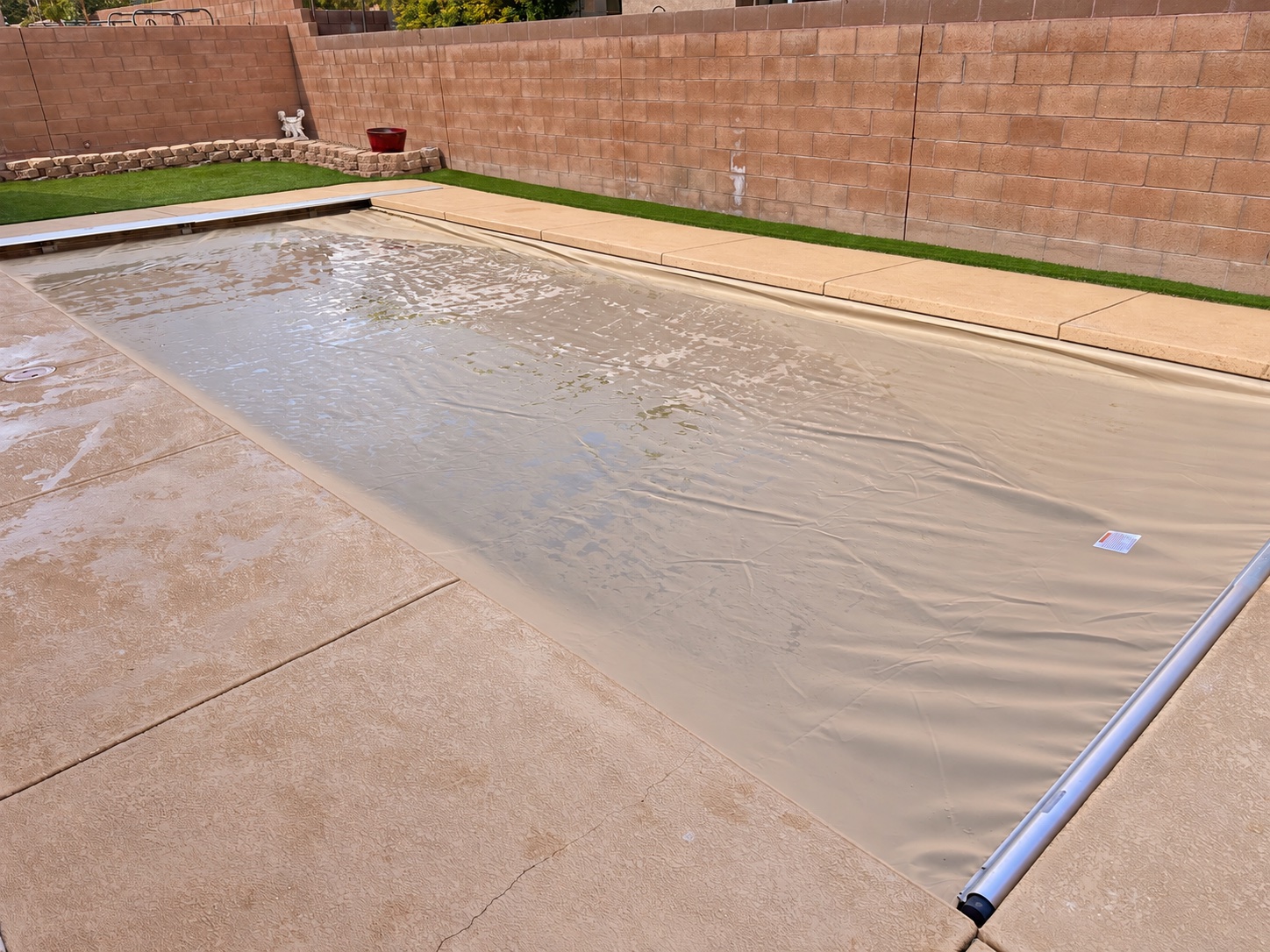 Completed tan pool-cover replacement in northwest Albuquerque