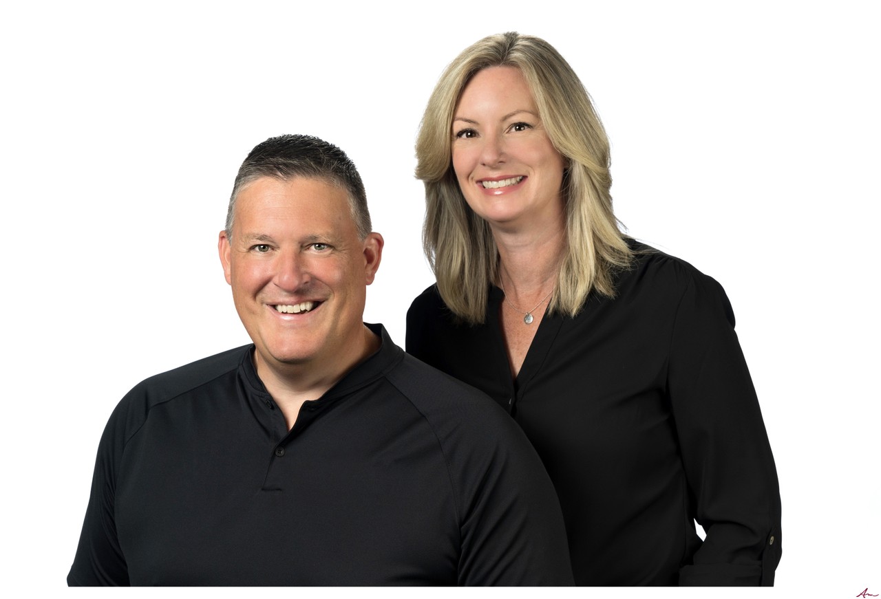Carrie and Michael Cook, owners of Gotcha Covered Halifax, business portrait