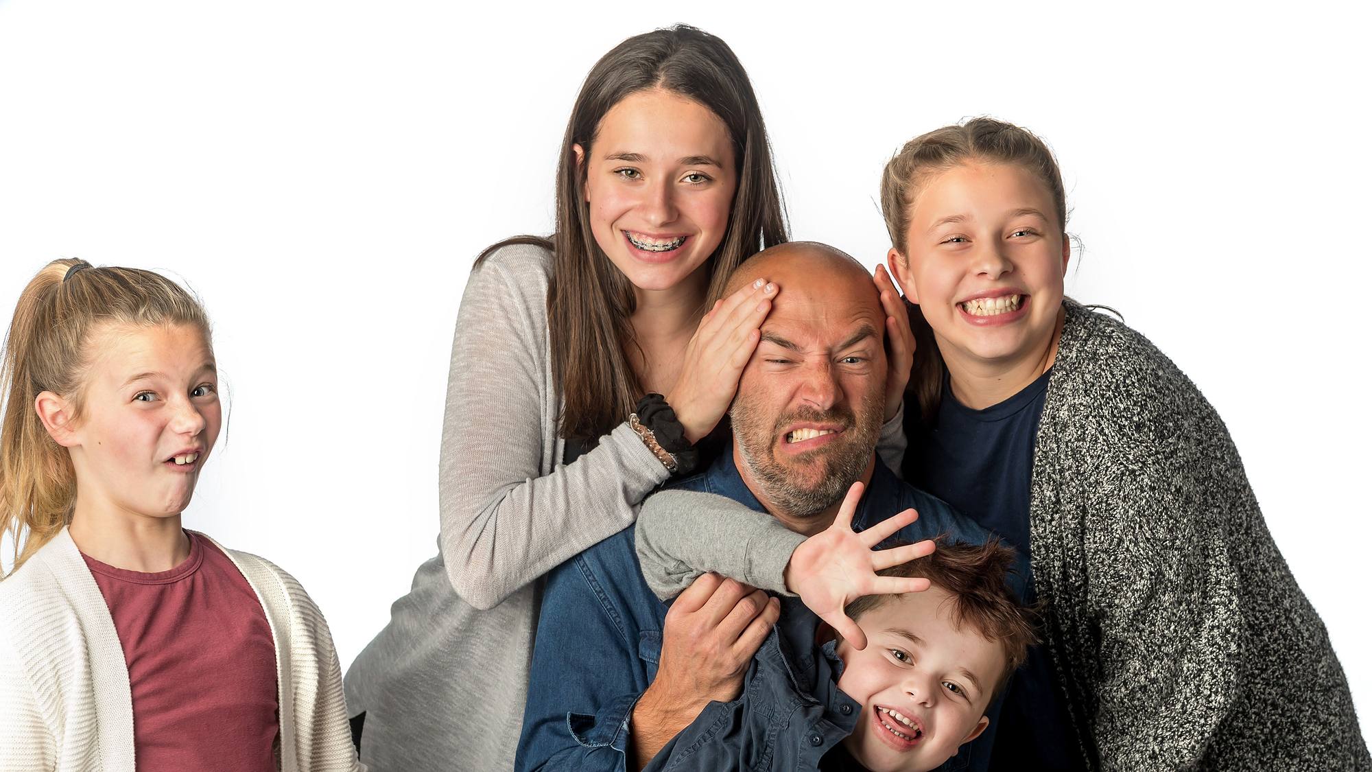 Family of five goofing around on a white studio backdrop - Halifax family portrait