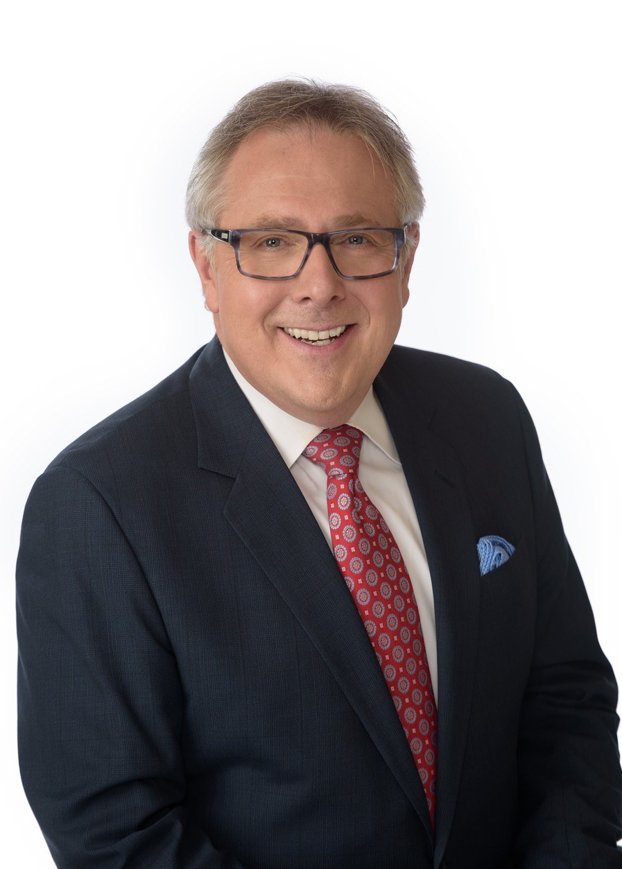 Headshot of CTV News Atlantic anchor Steve Murphy in a navy suit and red tie, Halifax studio