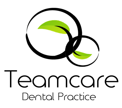 Teamcare Dental Practice logo with two black circles overlapping and green leaf shapes inside.
