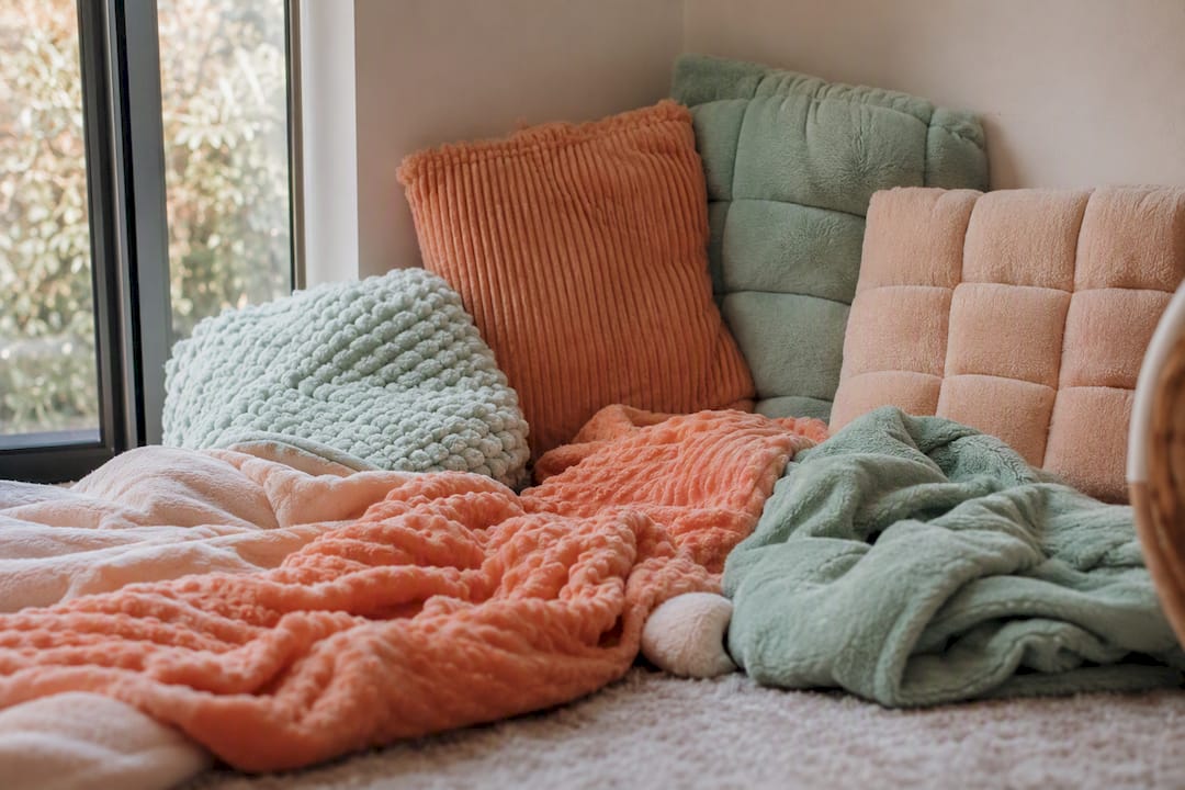 Weighted cushions and tactile blankets