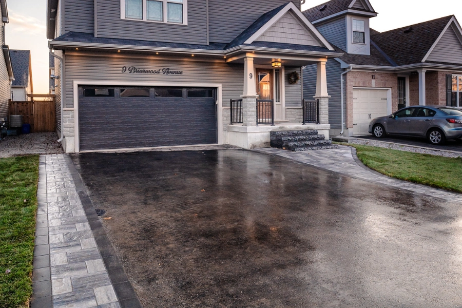 Interlocking paver driveway installation at a Kawartha Lakes home by TEG Contracting