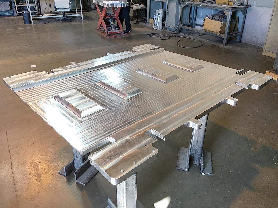 Reverse-engineered precision component on CMM inspection table at IMT Precision