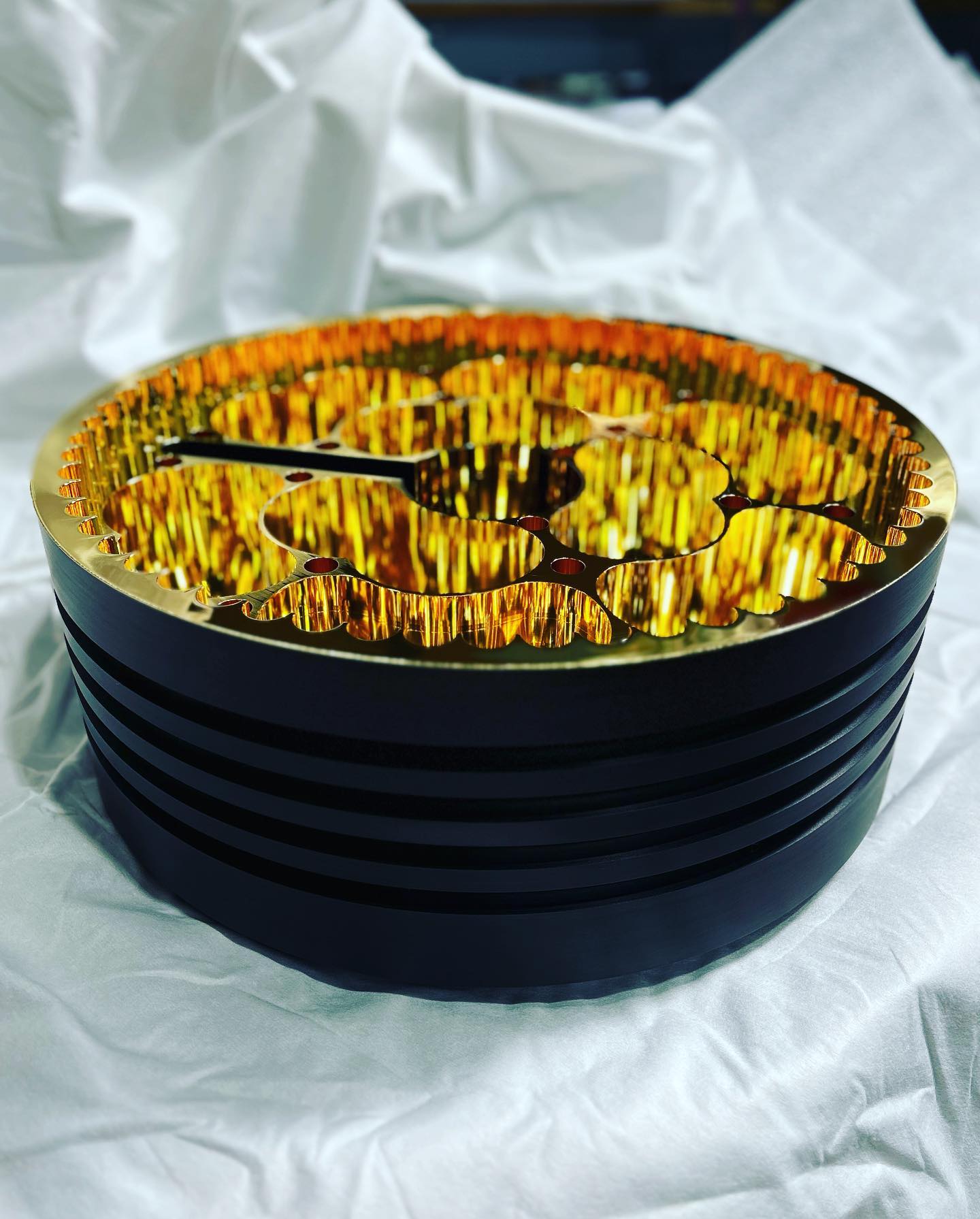 Precision-engineered metal part in IMT Precision's CNC machining department
