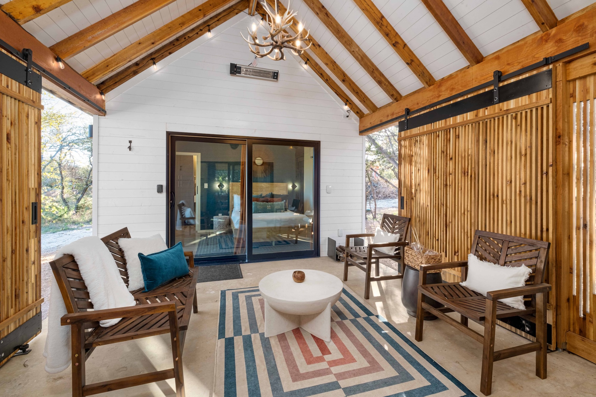 Cabin interior at Lucky Arrow Springs with a vaulted ceiling and clawfoot bath