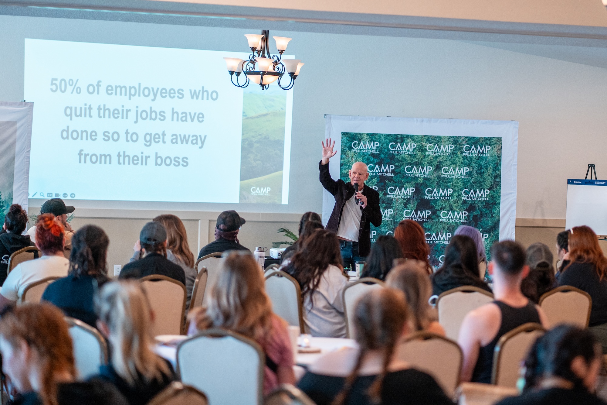 Industry keynote on stage at Camp Paul Mitchell, produced by Allaway