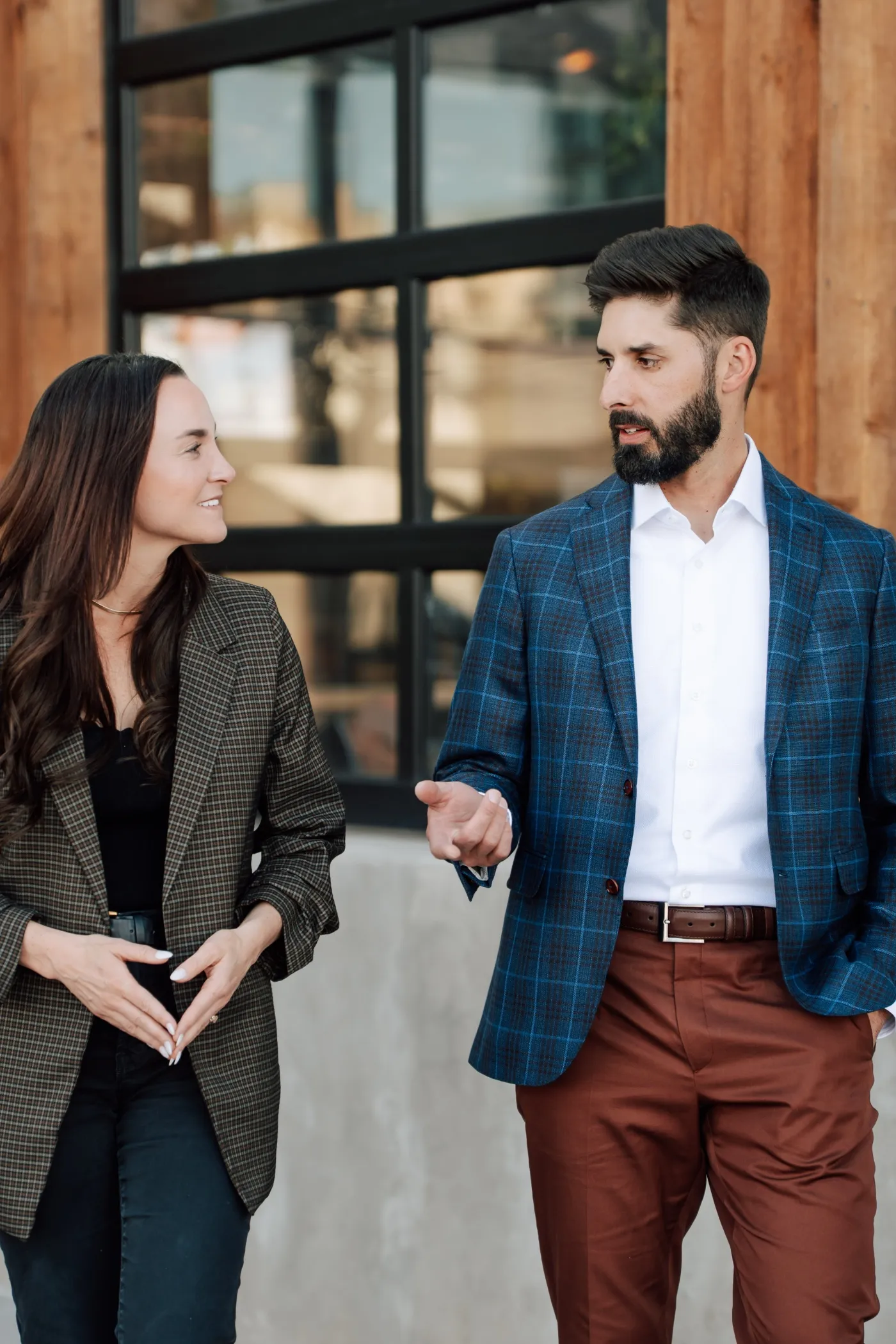Man standing in sport coat looking off camera