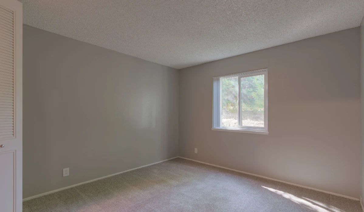 Empty bedroom with window