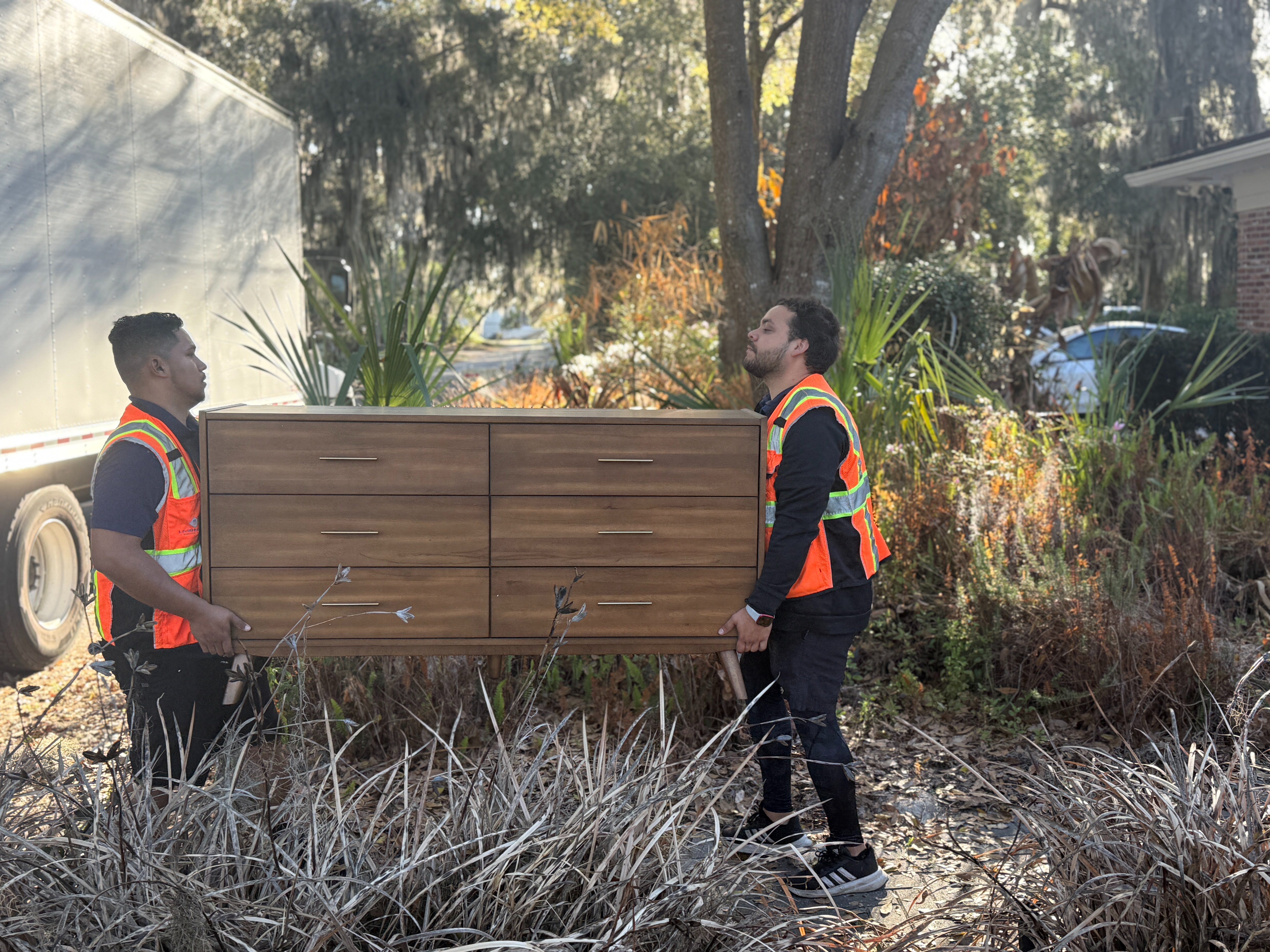 Metropolitan Warehouse & Delivery carrier loading furniture