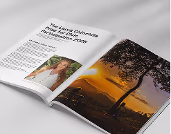 An open printed spread for The Laura Chinchilla Prize for Civic Participation 2025, showing a portrait photograph alongside a full-bleed sunset landscape.