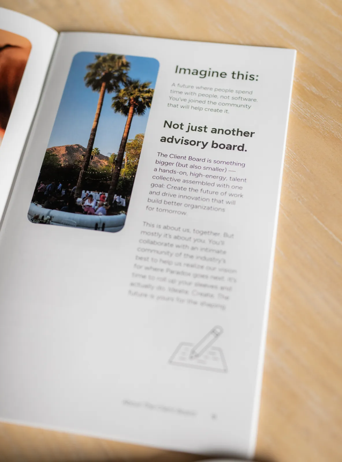 Magazine page with photo of palm trees and people, and text about a client advisory board community.