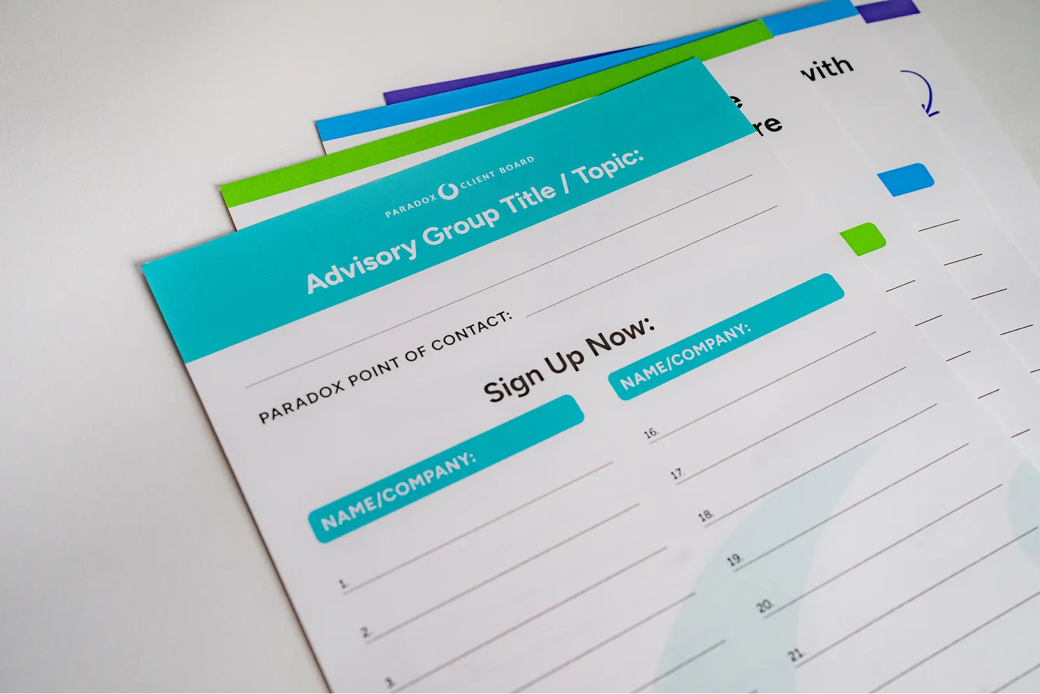 Sign-up sheets titled 'Advisory Group Title / Topic' with name and company fields for multiple entries.