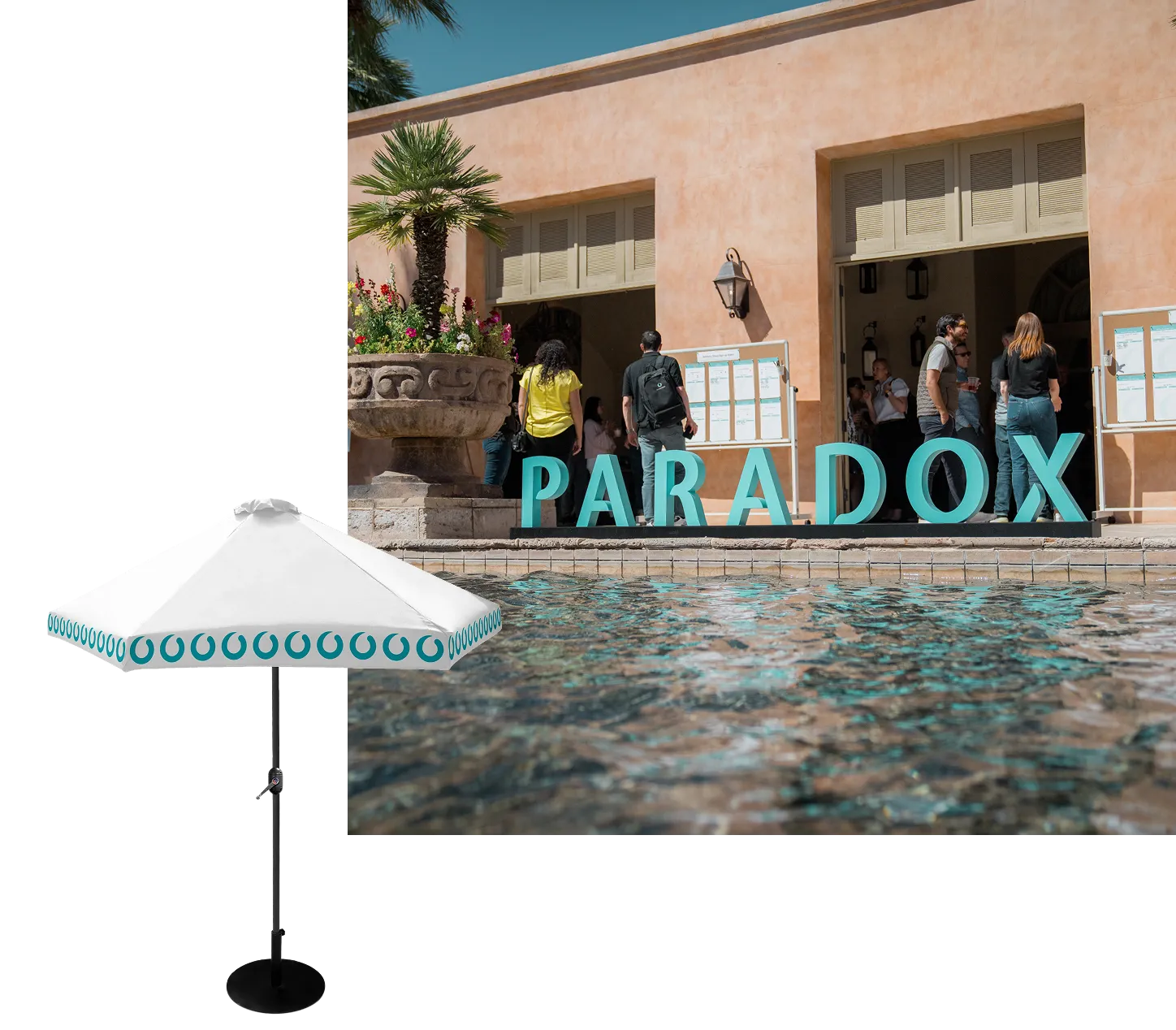 People near a building entrance with large letters spelling PARADOX by a reflective pool.