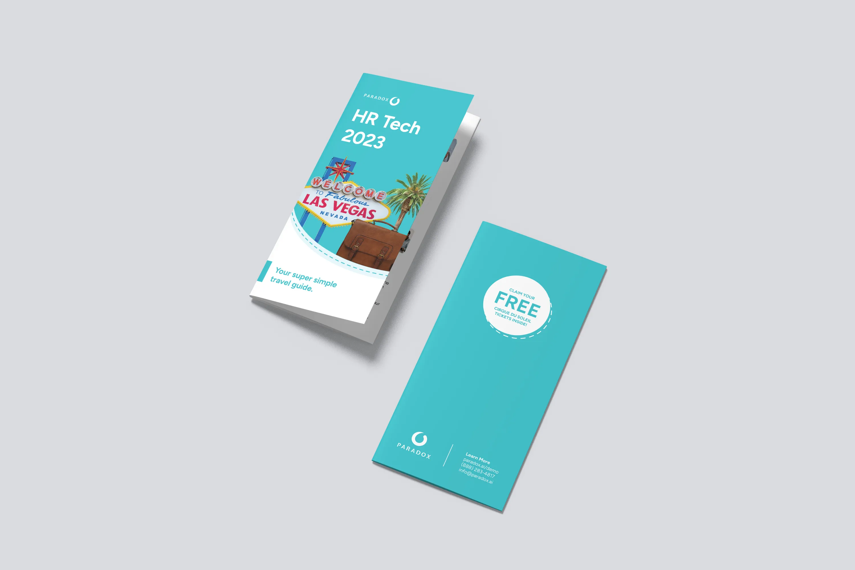 A teal and white Paradox trifold brochure shown front and back on a grey background.
