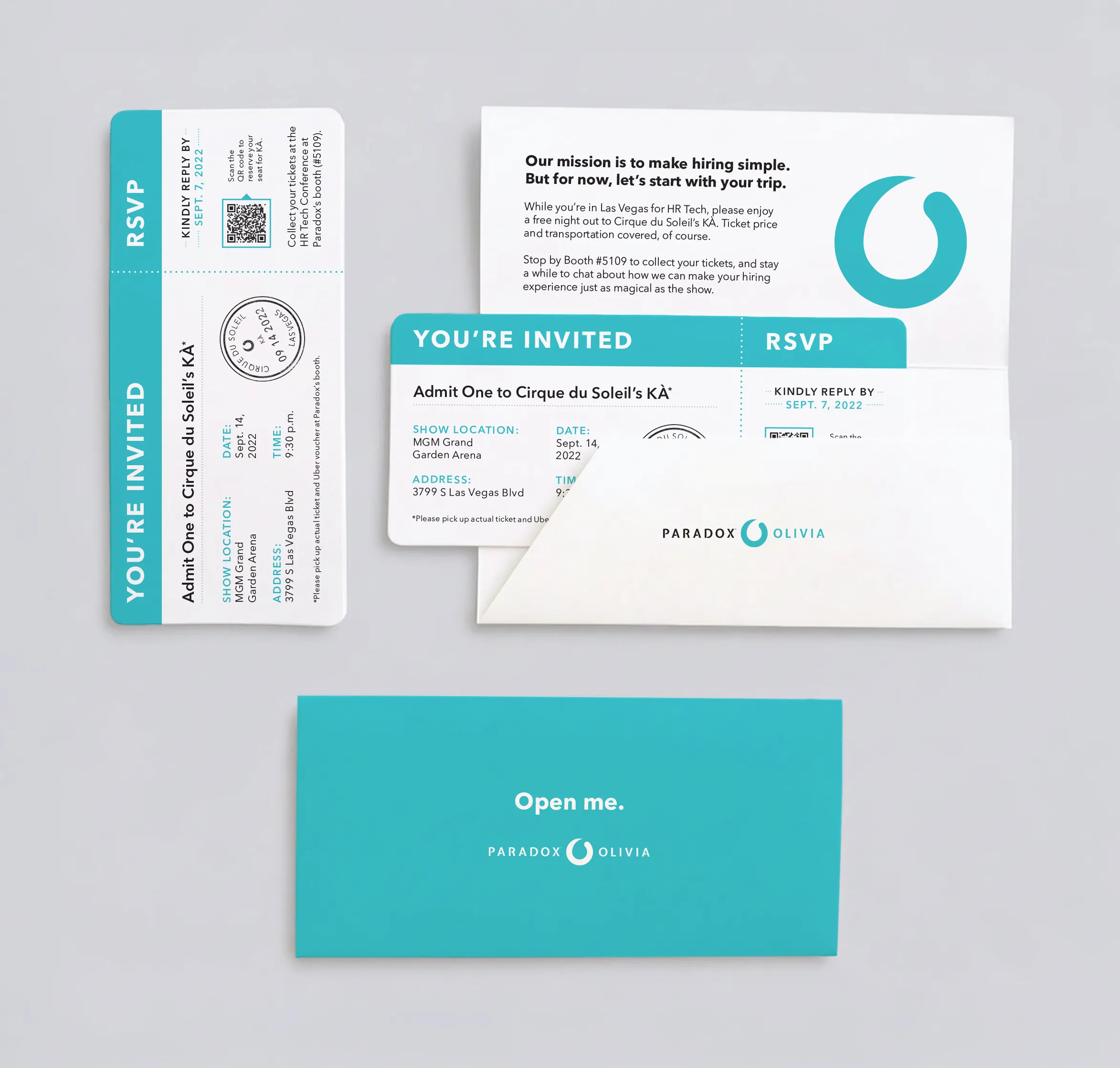 A Paradox event invitation set including an RSVP card, envelope and a teal card reading "Open me."