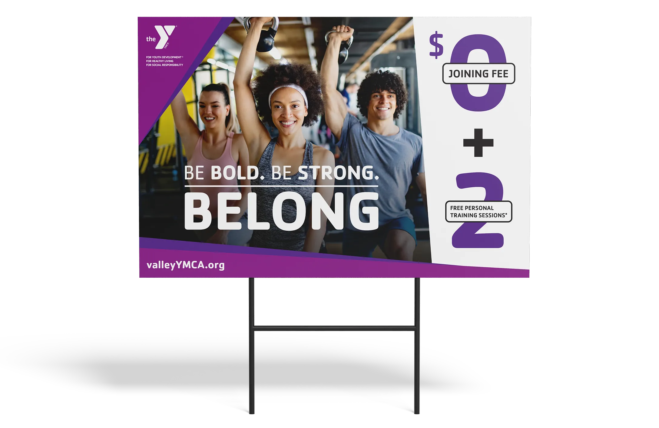 A YMCA lawn sign in purple reading "Be Bold. Be Strong. Belong." with a $0 joining fee.