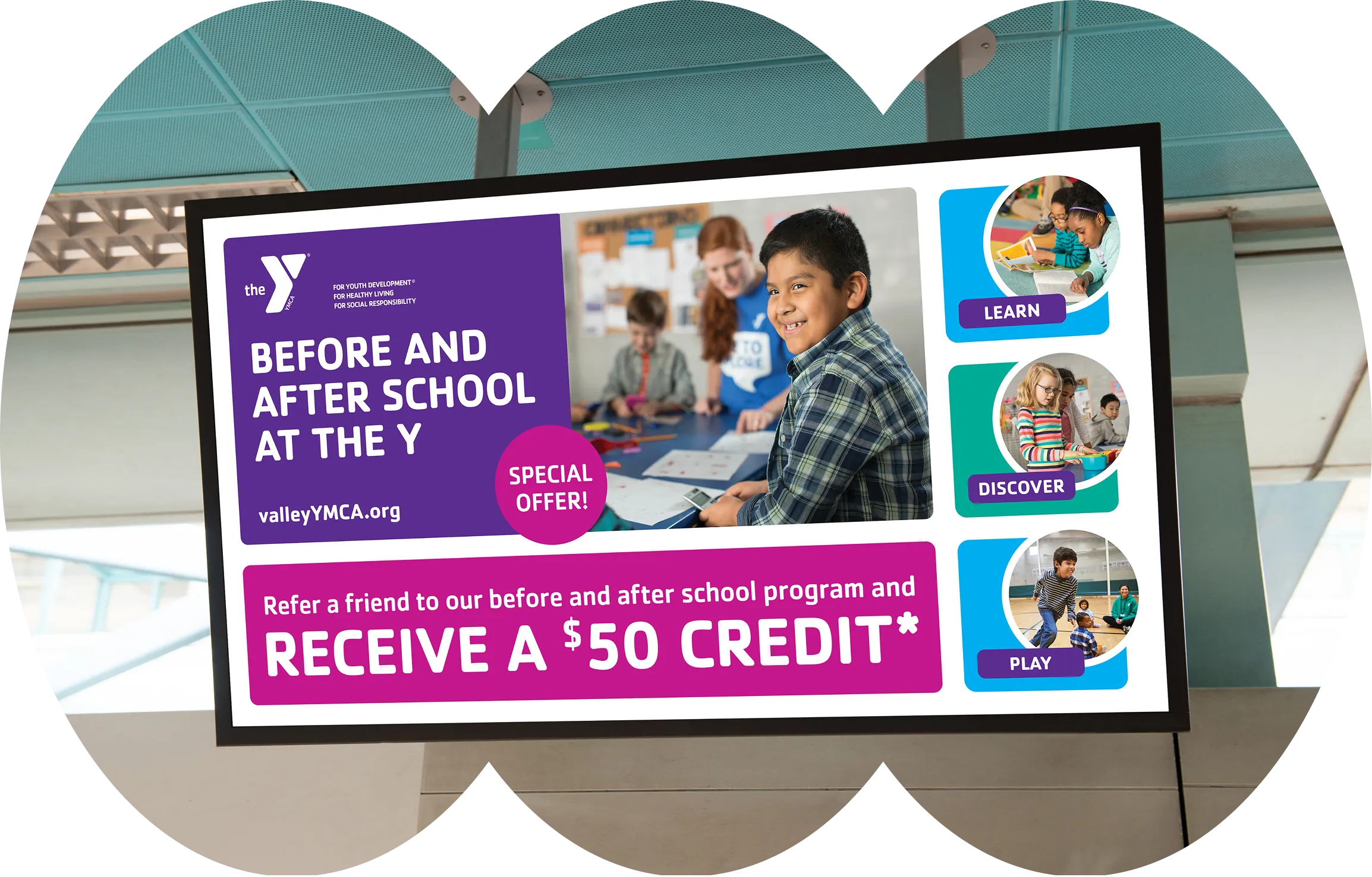 A corridor screen promoting the YMCA before and after school programme with a $50 credit offer.