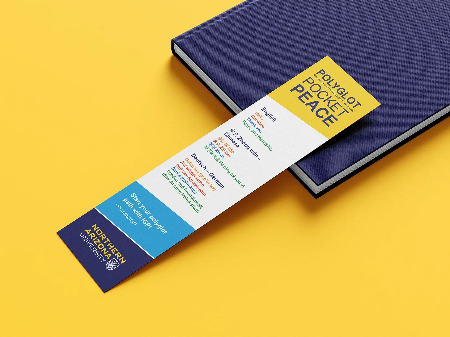 A "Polyglot Pocket Peace" bookmark with greetings in English, Chinese and German.